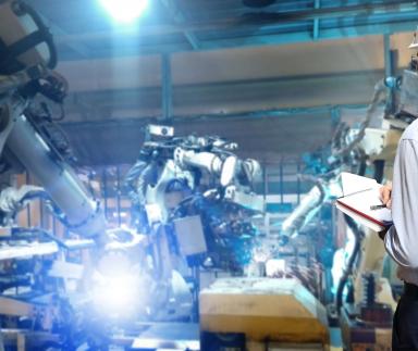 Machines constructing a car.