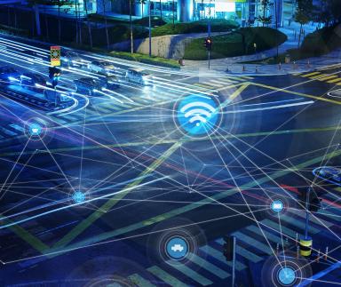 A digital rendering of a street and cars.